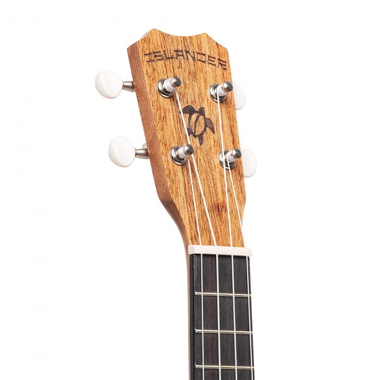 Traditional concert ukulele with mahogany top and Honu turtle engraving